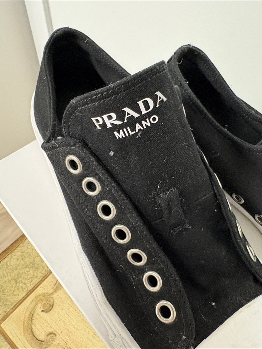 Prada Black Canvas Slip-On Sneakers with White Toe Cap - Picture 3 of 3